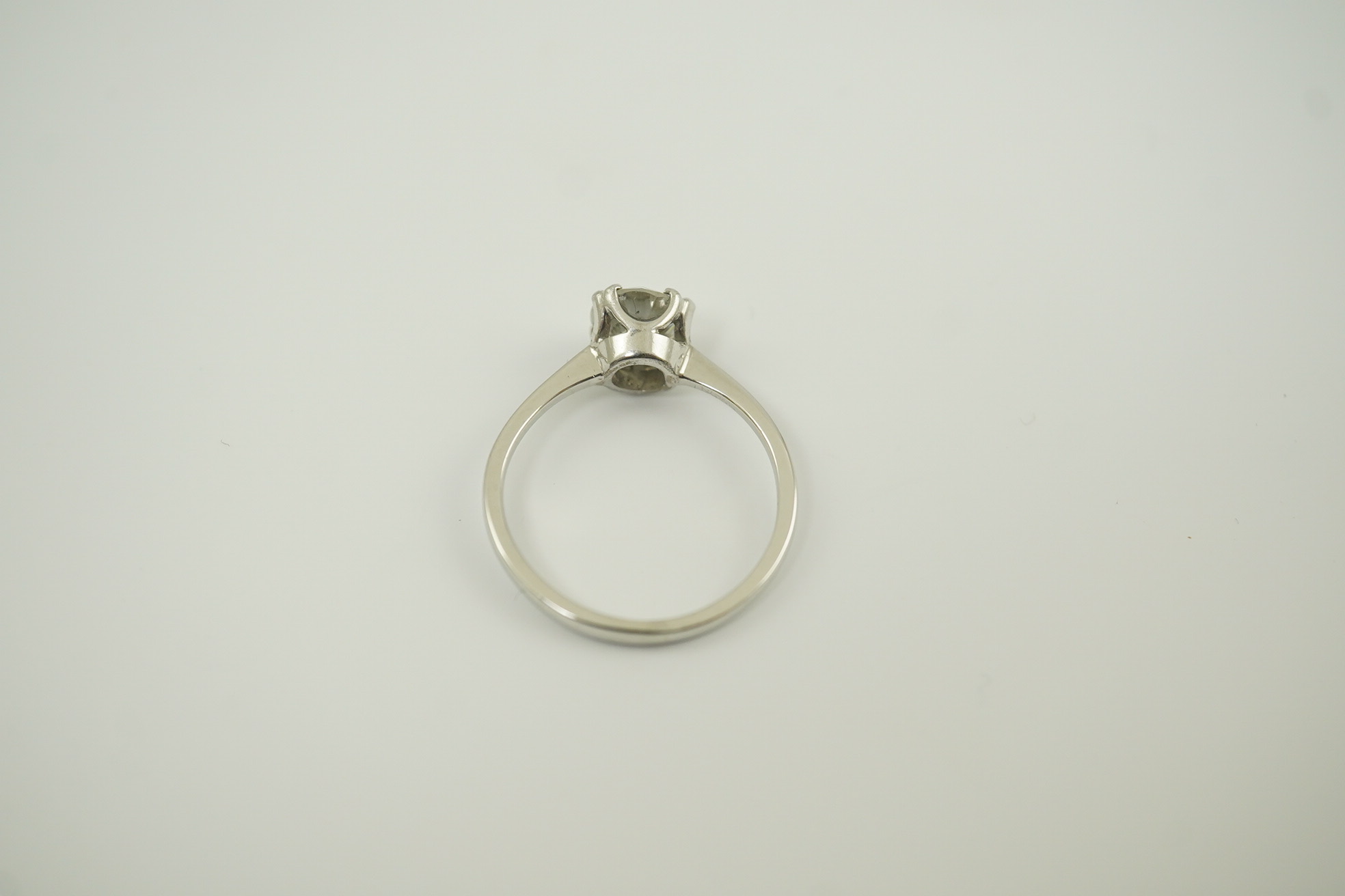 An 18ct white gold and solitaire diamond set ring